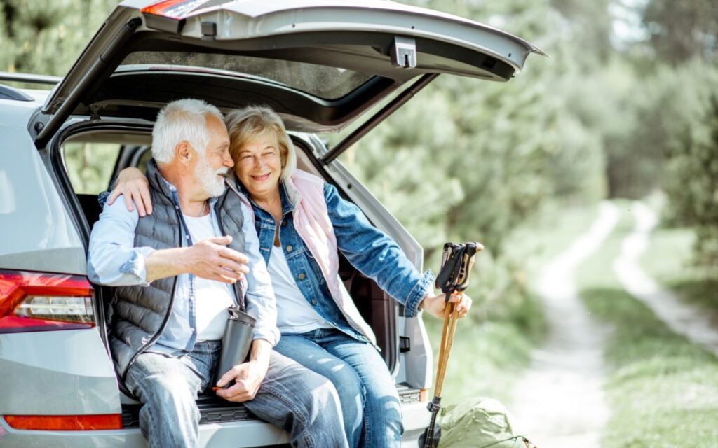 couple in hatchback of a car